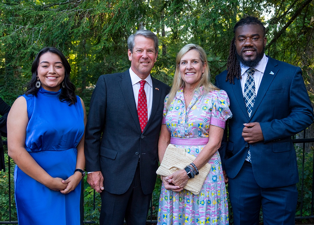 From left, Dalton State College graduate and current University of Georgia student Jennifer Granados, Gov. Brian Kemp, First Lady Marty Kemp and College of Coastal Georgia student Jovan Mills. Granados and Mills are each recipients of scholarships funded in part through the USG Foundation.