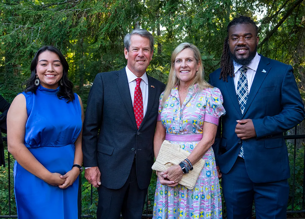 From left, Dalton State College graduate and current University of Georgia student Jennifer Granados, Gov. Brian Kemp, First Lady Marty Kemp and College of Coastal Georgia student Jovan Mills. Granados and Mills are each recipients of scholarships funded in part through the USG Foundation.