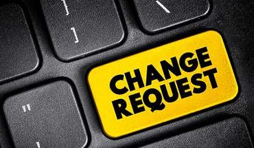a keyboard with a button saying Change Request