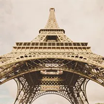 Looking upwards from the base of the Eiffel Tower in Paris, France.