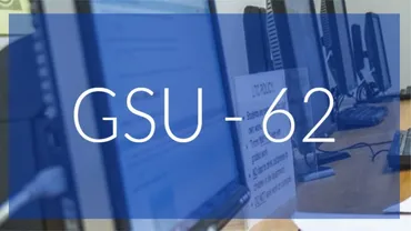 A row of computers with a blue transparent color overlay with the text 