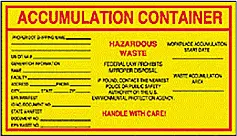 Yellow label with red text for Accumulation Container